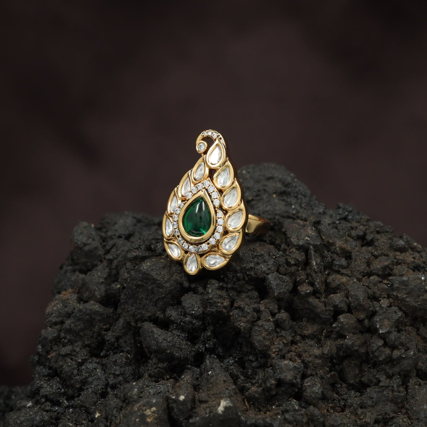 Festive Paisley Design Kundan Finger Ring With Sculpted Border Styling