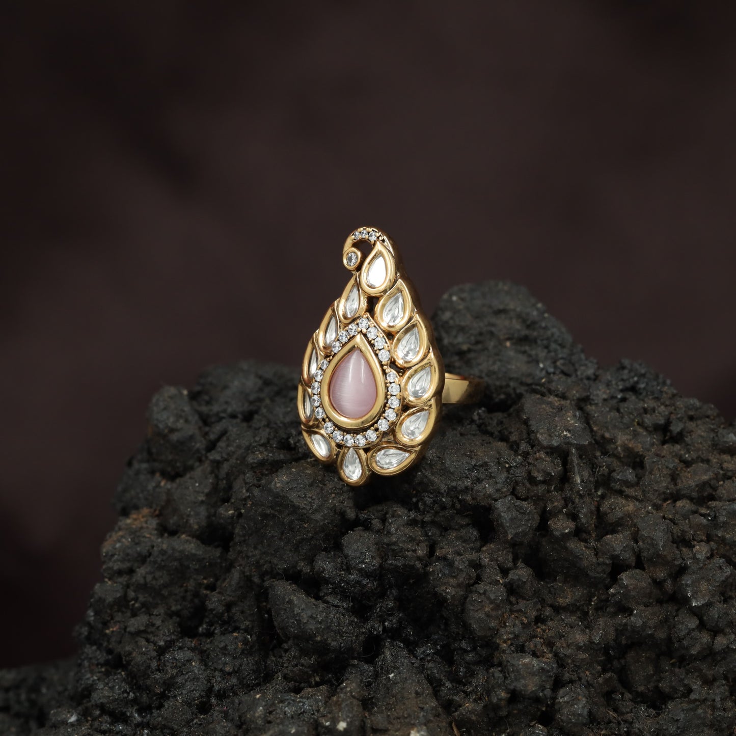 Festive Paisley Design Kundan Finger Ring With Sculpted Border Styling