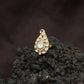 Festive Paisley Design Kundan Finger Ring With Sculpted Border Styling