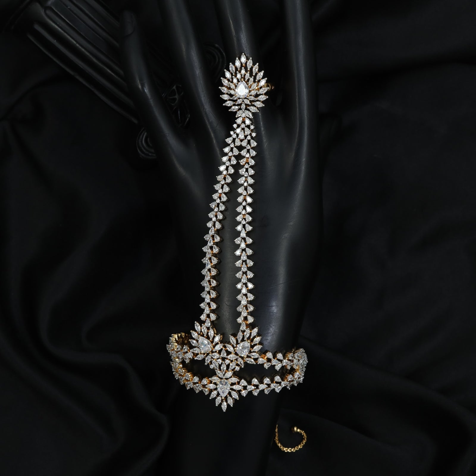 Exquisite Cascade Chain Panja with Floral Centre Arrangement