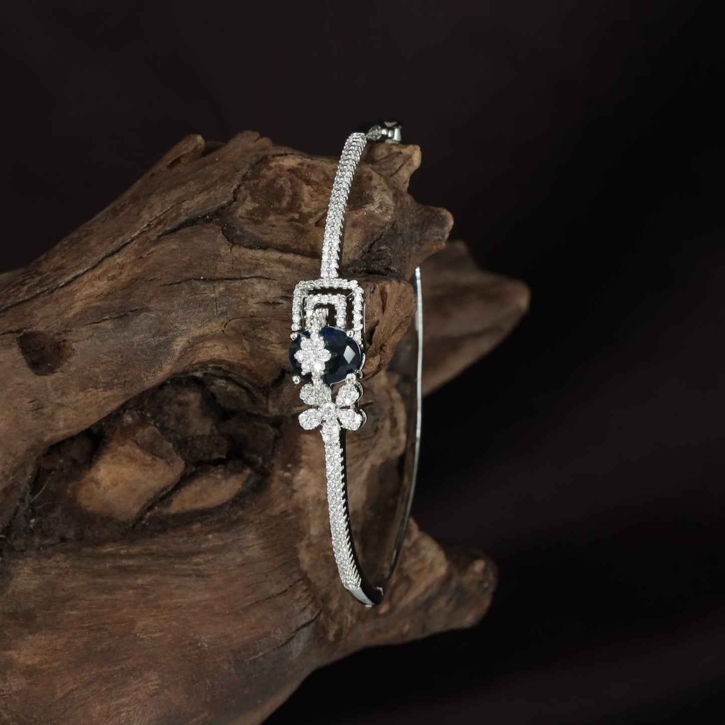 Deltawork Floral Kada with Sculpted Blossom Placement and Minimal Band Flow