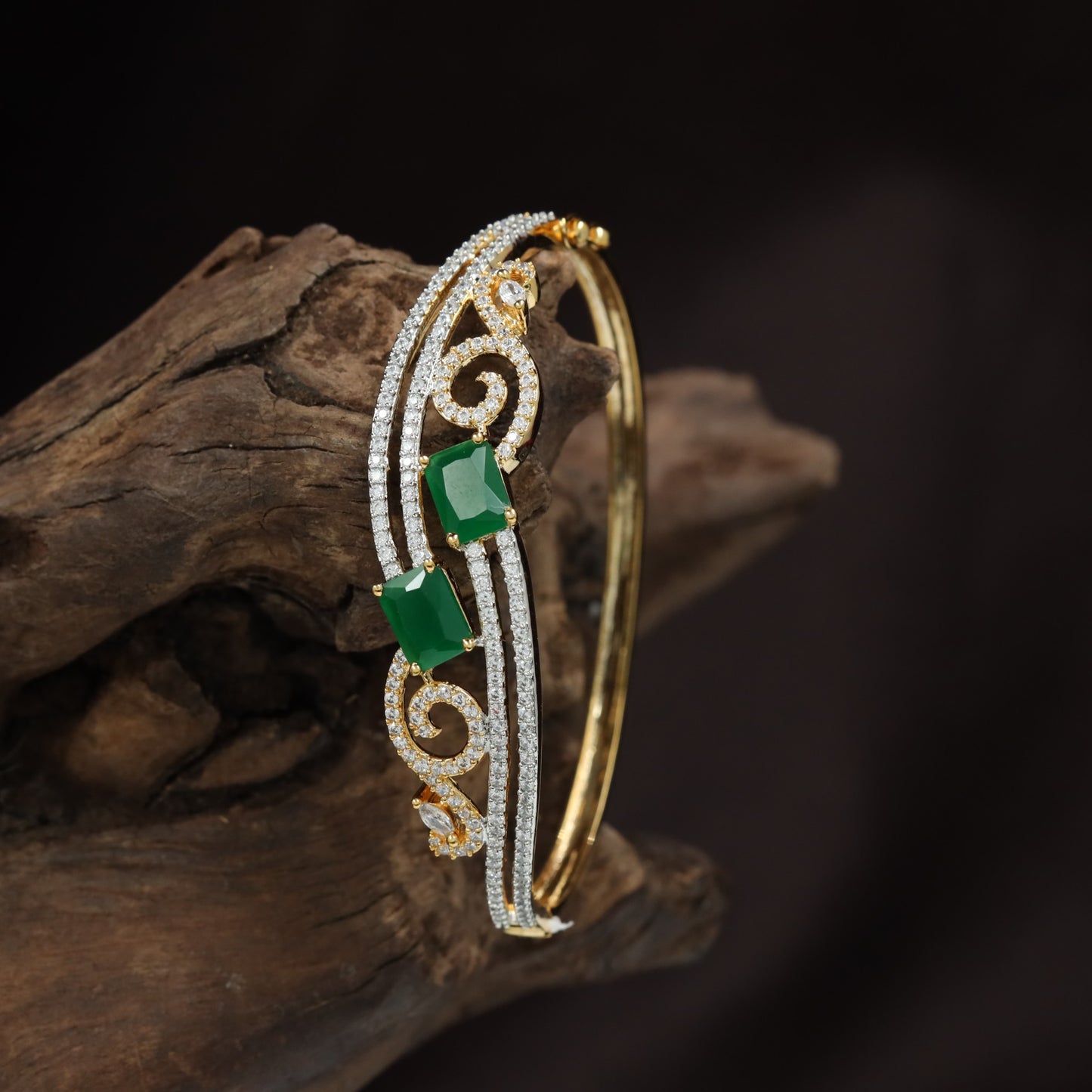 Open Scrollwork Kada with Emerald Cut Centre Accent Design