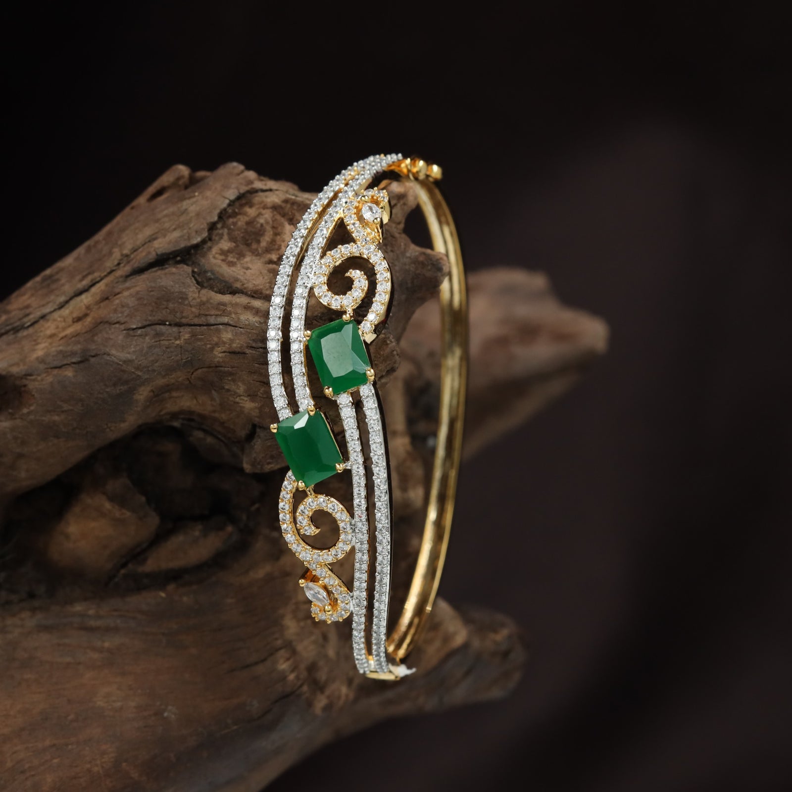 Open Scrollwork Kada with Emerald Cut Centre Accent Design