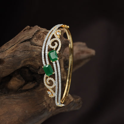 Open Scrollwork Kada with Emerald Cut Centre Accent Design