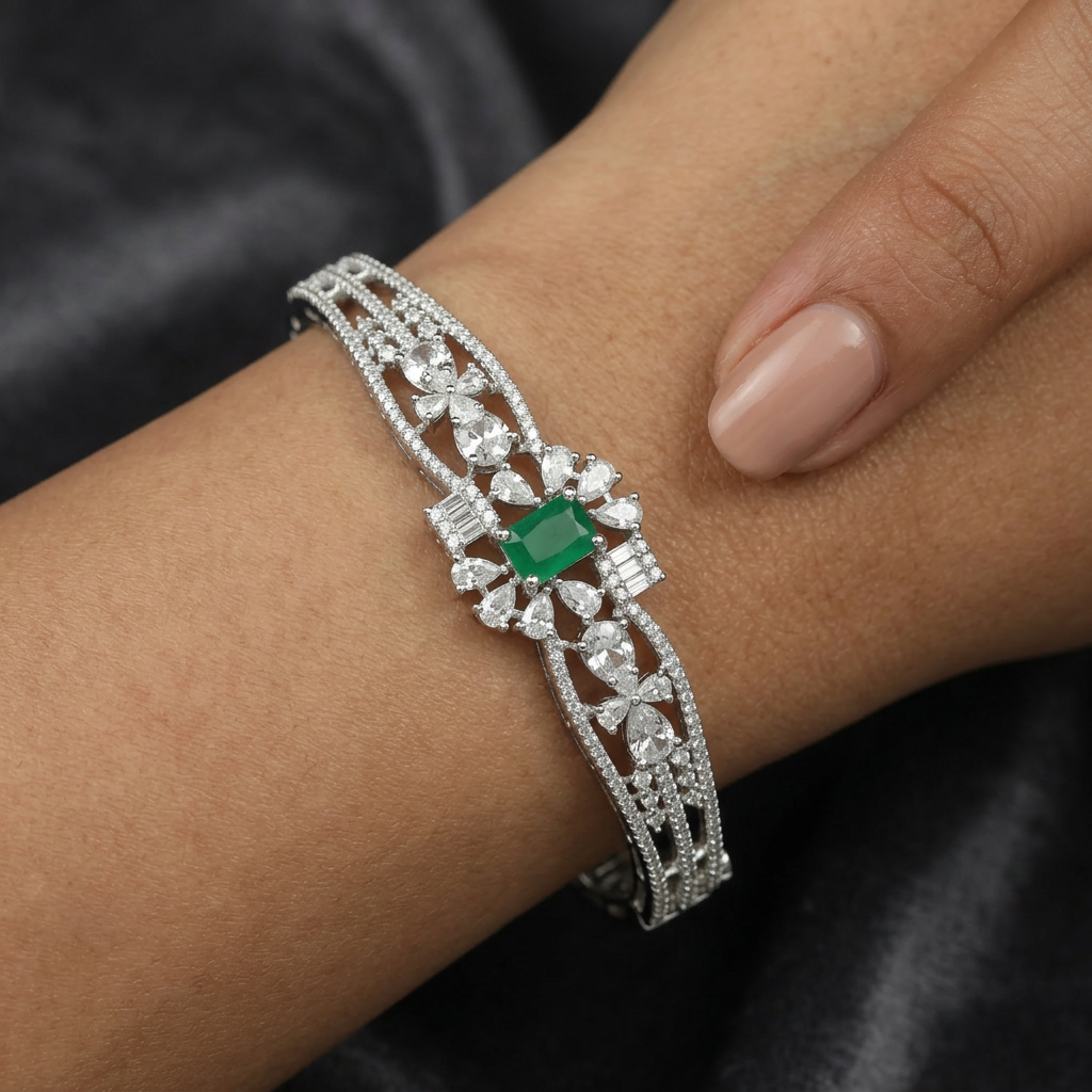 Open Frame Kada with Emerald Cut Centrepiece and Floral Detailing