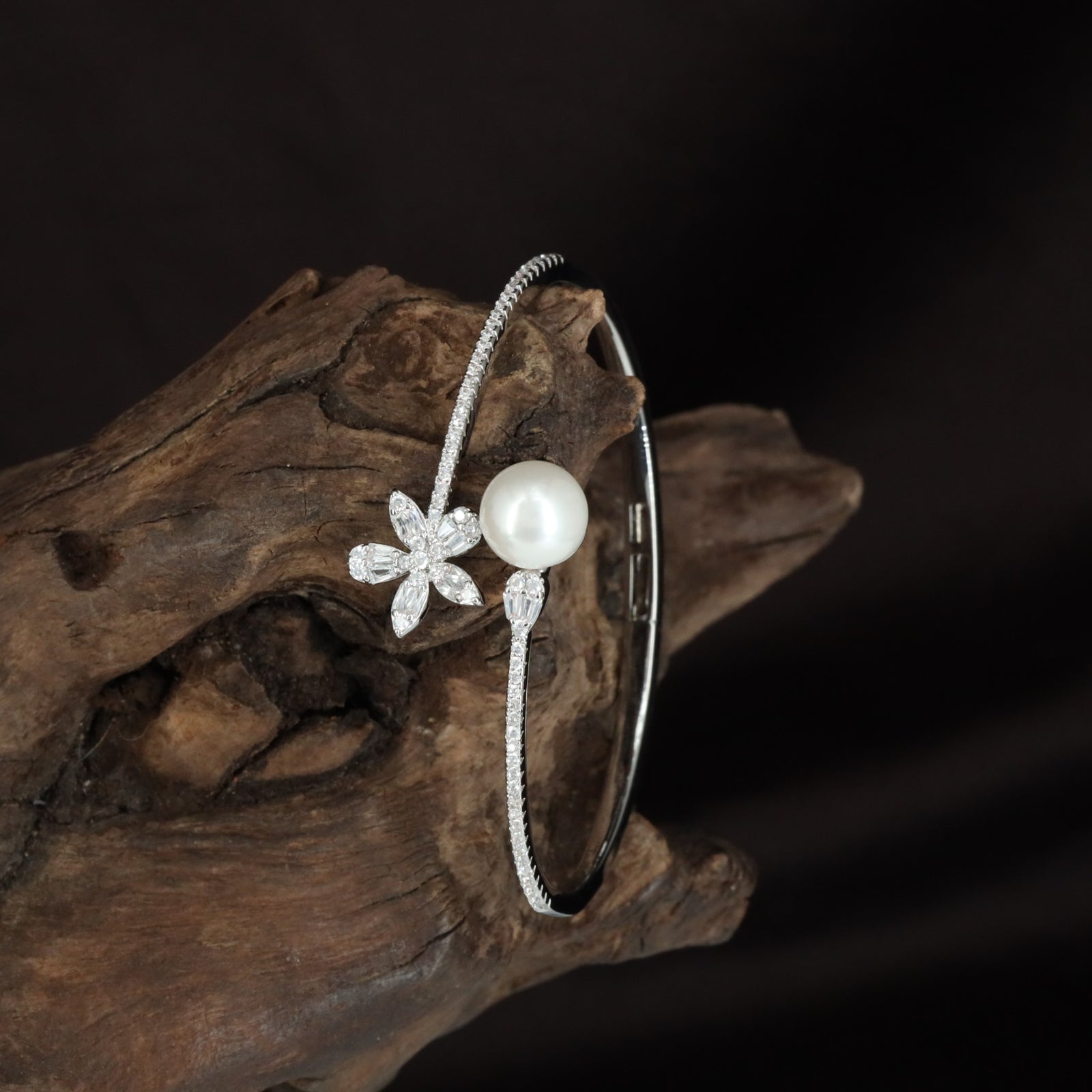 Petal Twist Kada with Floral Accent Placement and Sleek Open Cuff Shape