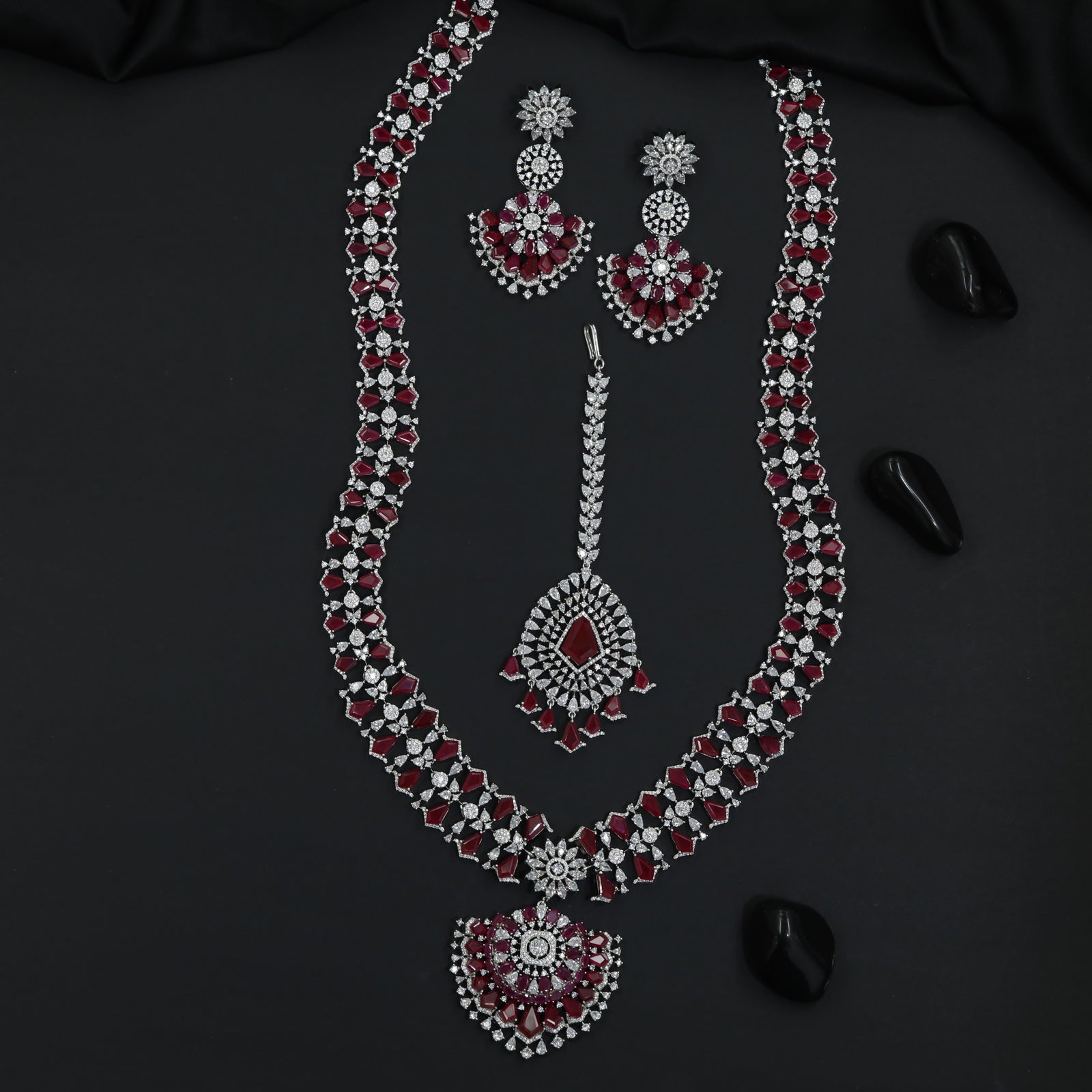 Occasion Wear Rhodium Long Haara Set with Floral Detailing Throughout