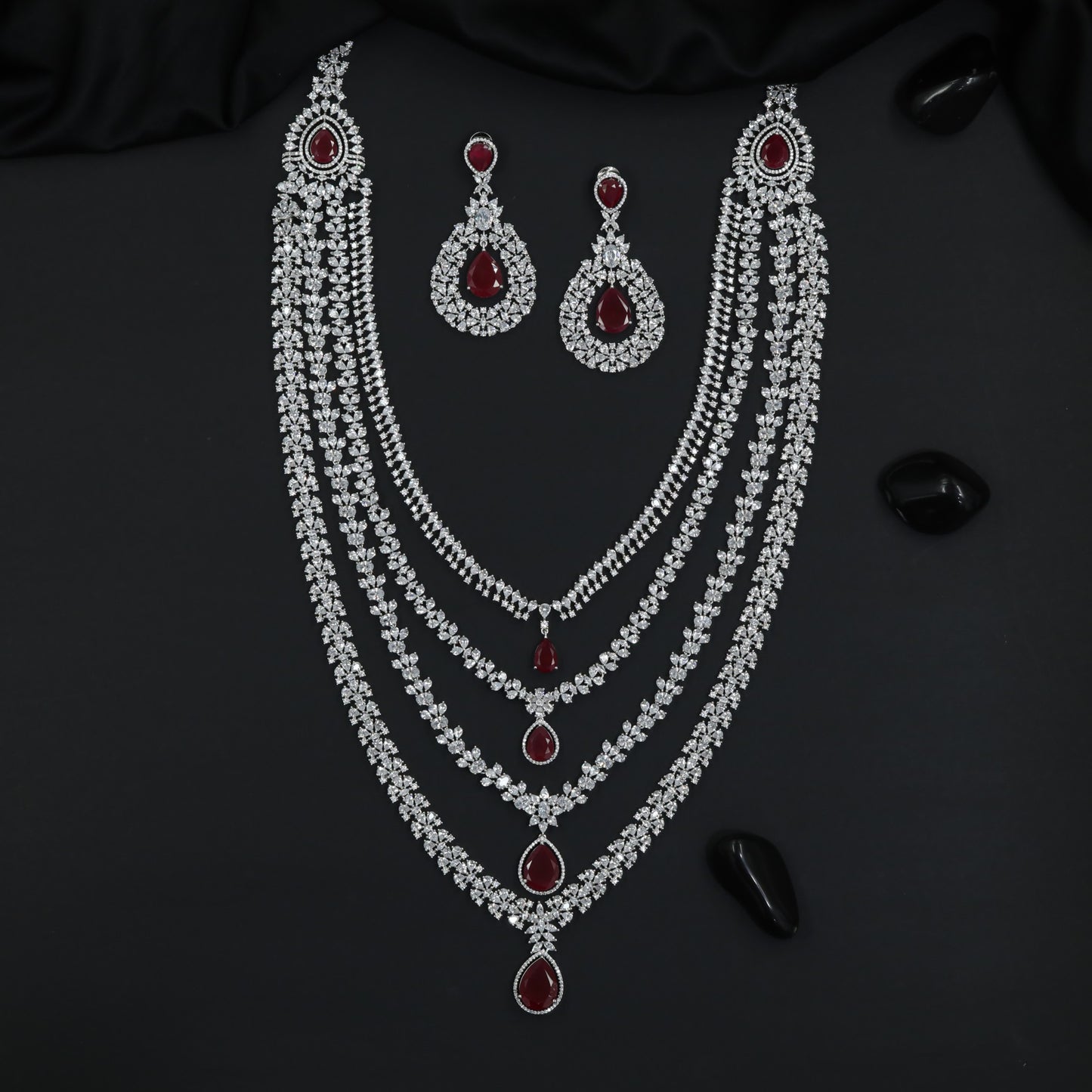 Bridal wear long haara with layered drape design and danglers