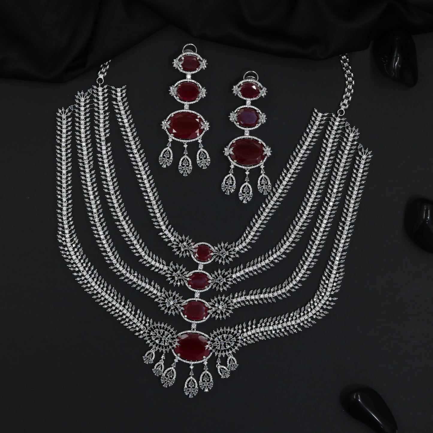 Premium necklace set with floral clusters and cascading drape design