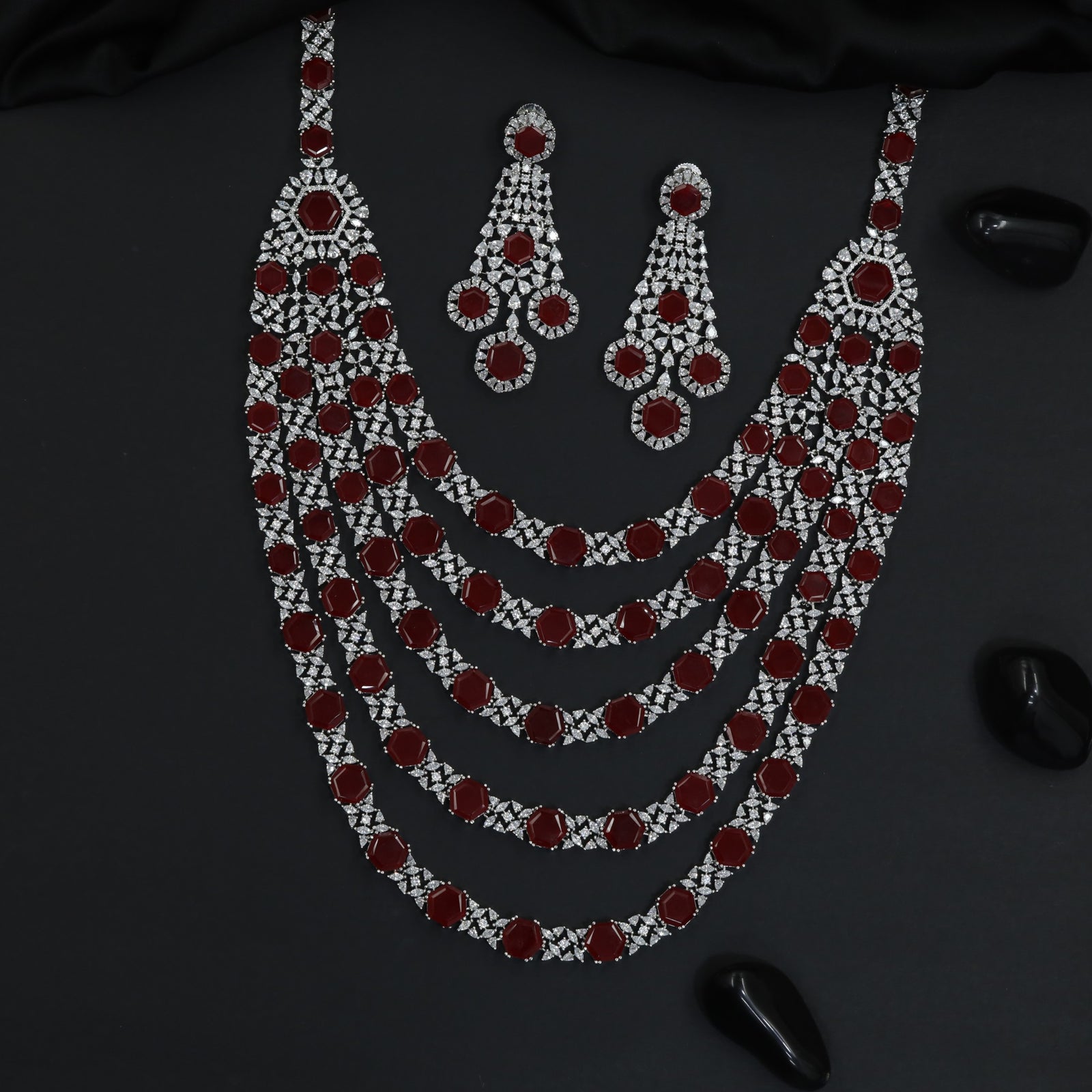 Multi layer long haara with geometric links and statement drops