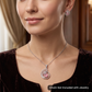 Timeless swirl pendant set with floral-inspired craftsmanship