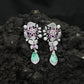 Floral Spray Rhodium Hanging Earrings with Pear Drop Accent