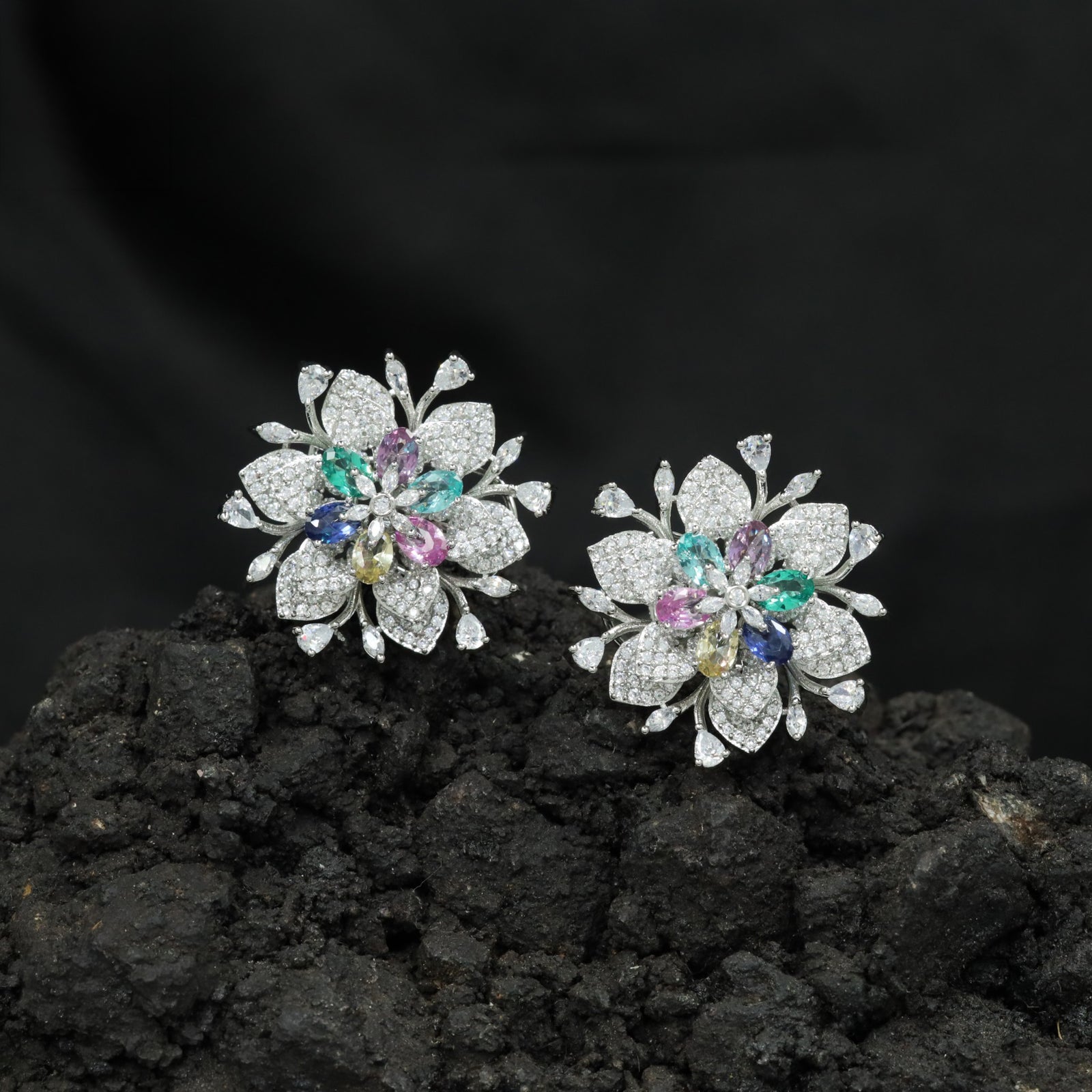 Botanical Rhodium Studs with Intricate Floral Petals and Leaf Details