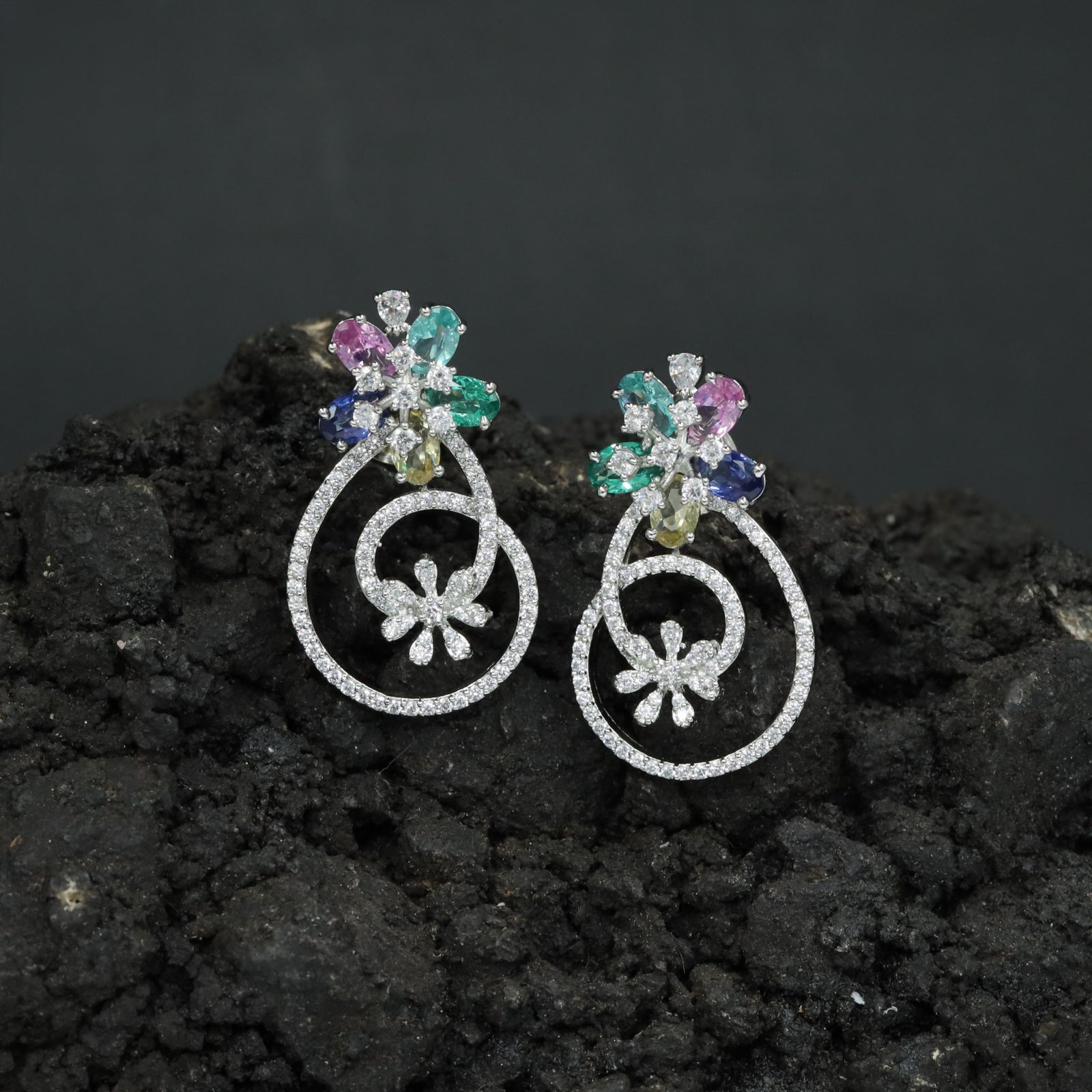 Couture Exclusive Rhodium Stud Featuring Twin Floral Clusters and Openwork Drops