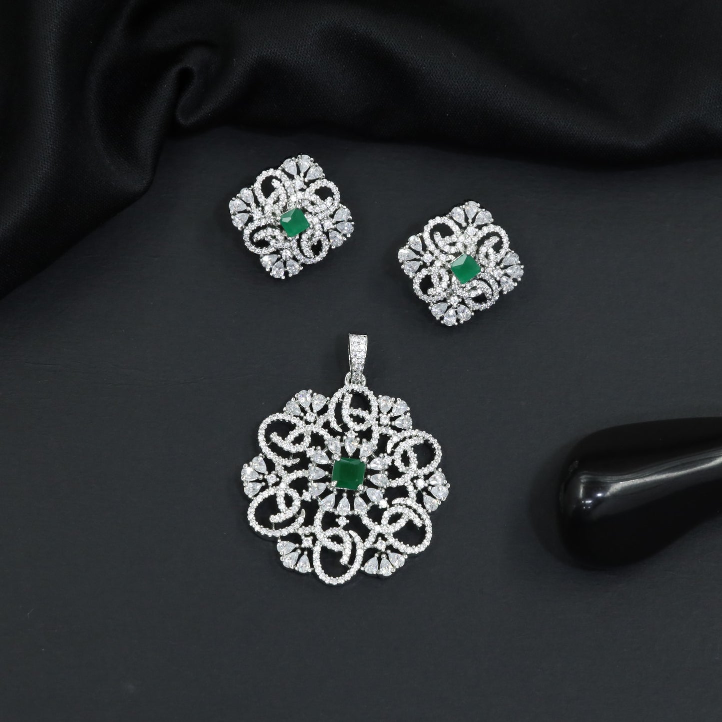 Openwork floral pendant set with scroll detailing