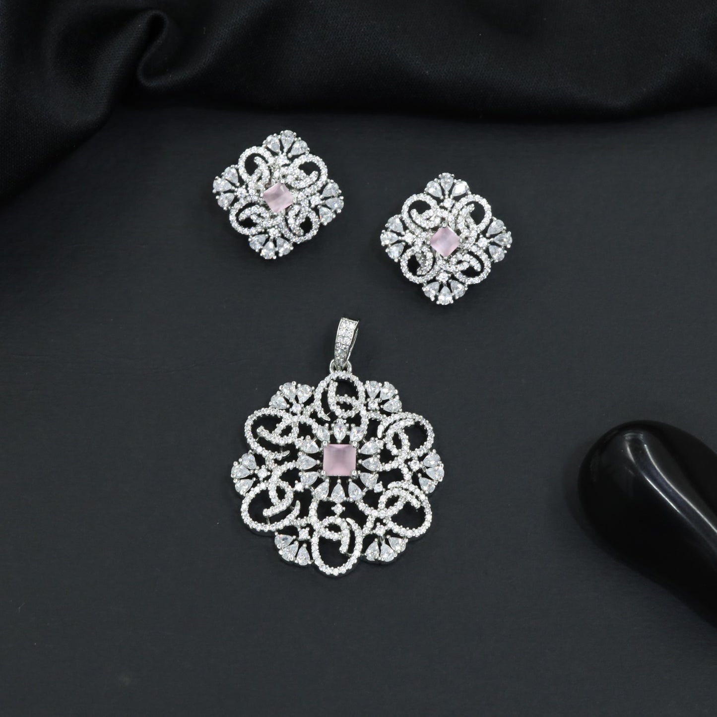 Openwork floral pendant set with scroll detailing