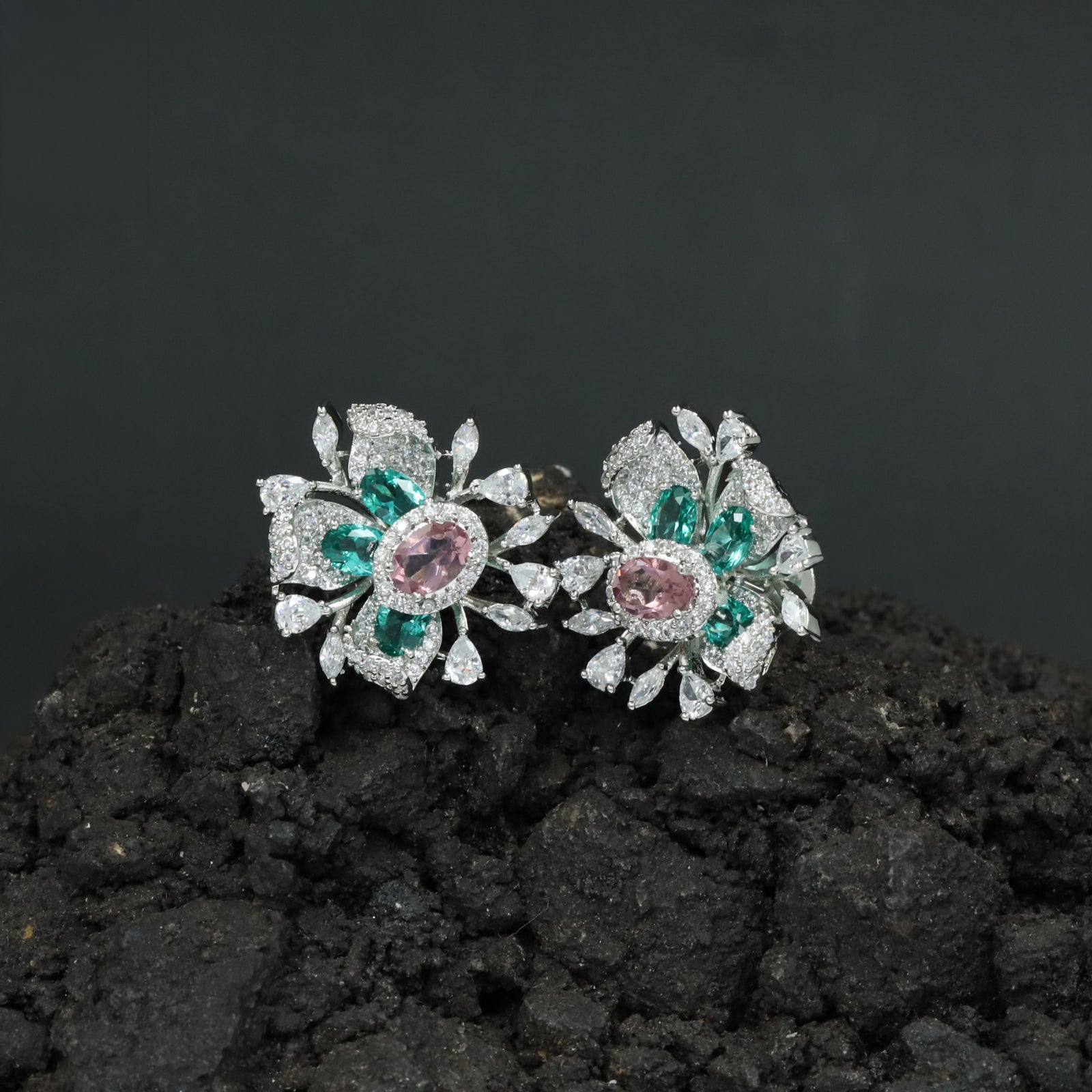 Graceful Rhodium Stud Showcasing a Floral Bloom Around an Oval Centre
