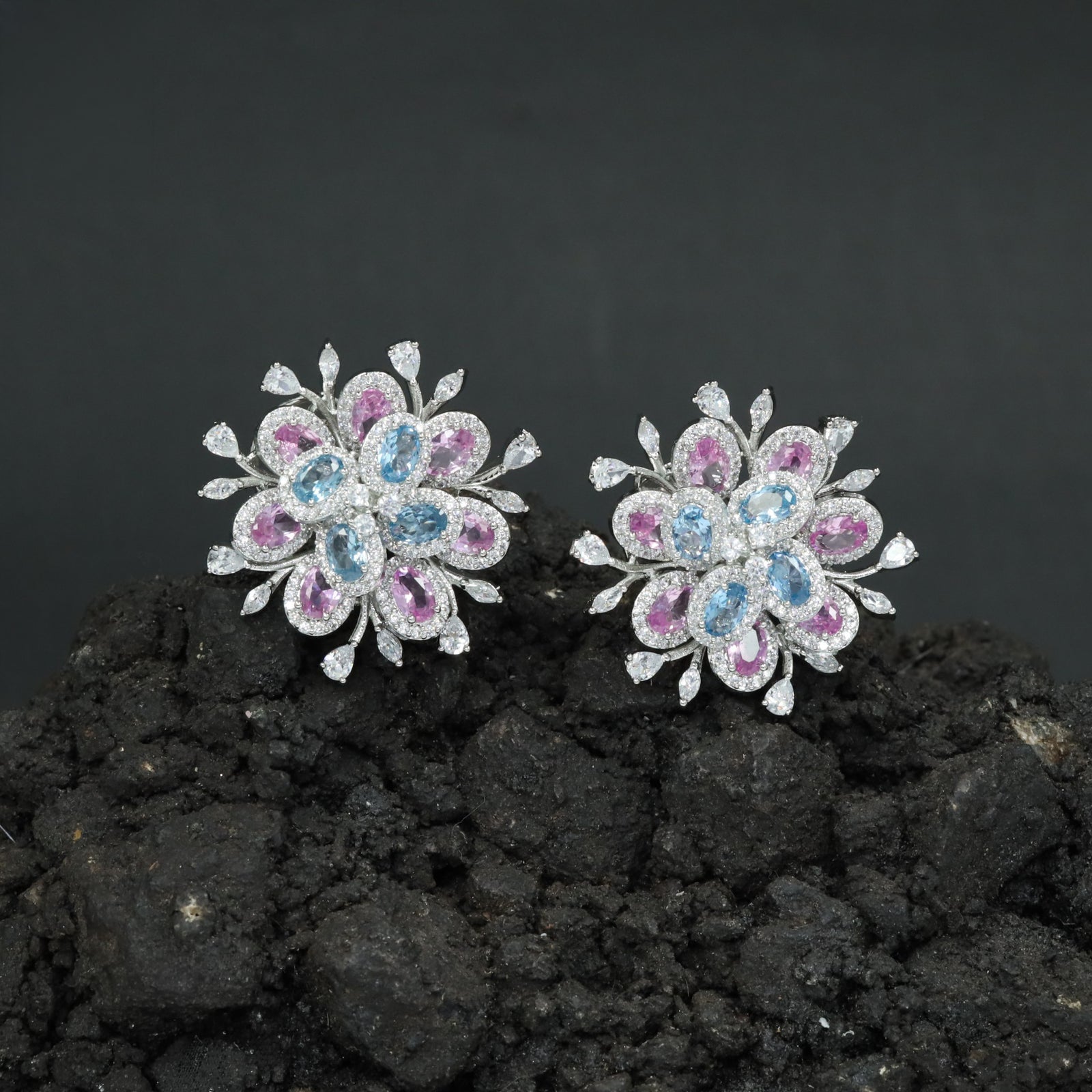 Floral Exclusive Rhodium Stud with Rounded Petal Settings and Radiating Leaf Accents