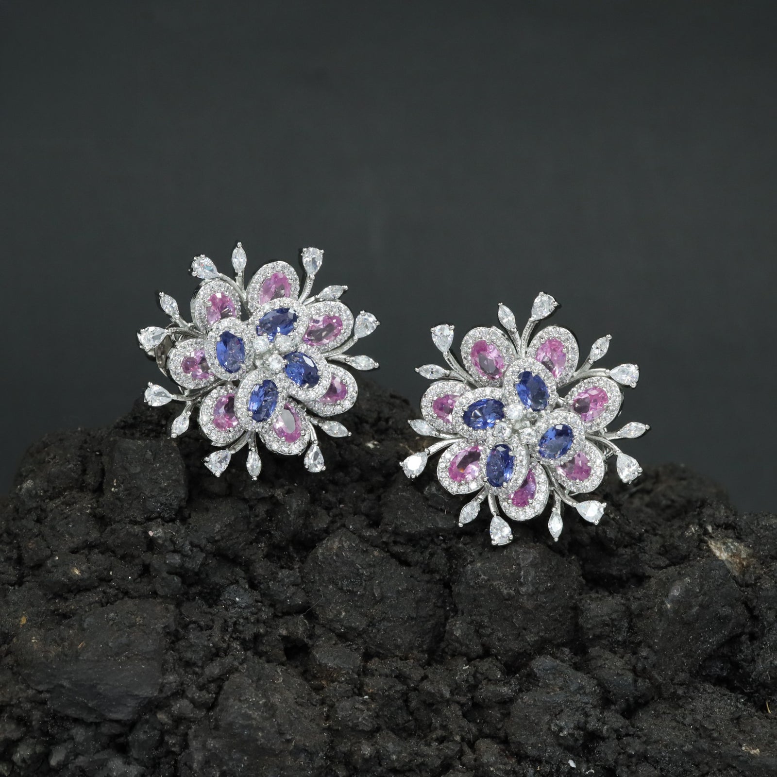 Floral Exclusive Rhodium Stud with Rounded Petal Settings and Radiating Leaf Accents