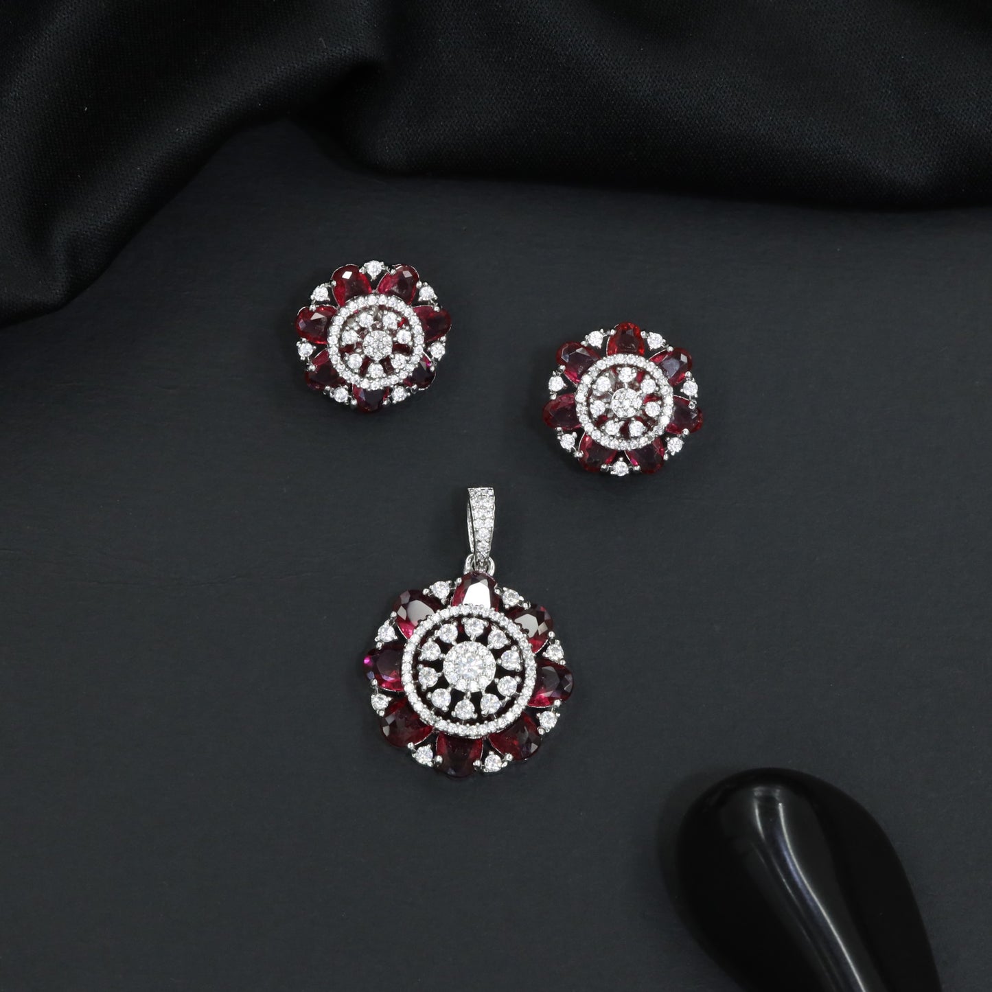 Designer pendant set featuring floral halo and circular styling