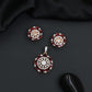 Designer pendant set featuring floral halo and circular styling