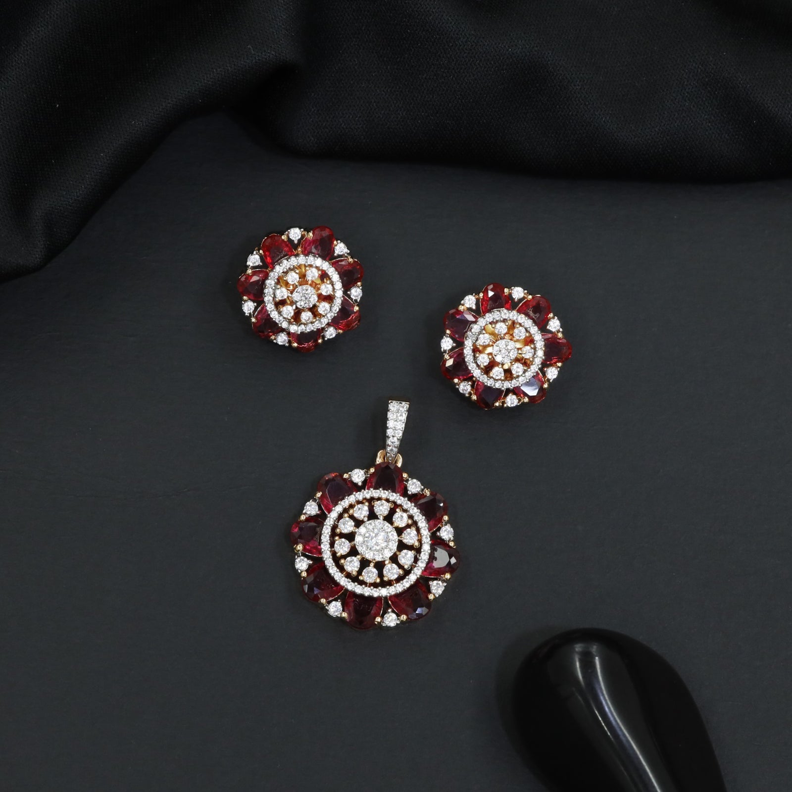 Designer pendant set featuring floral halo and circular styling