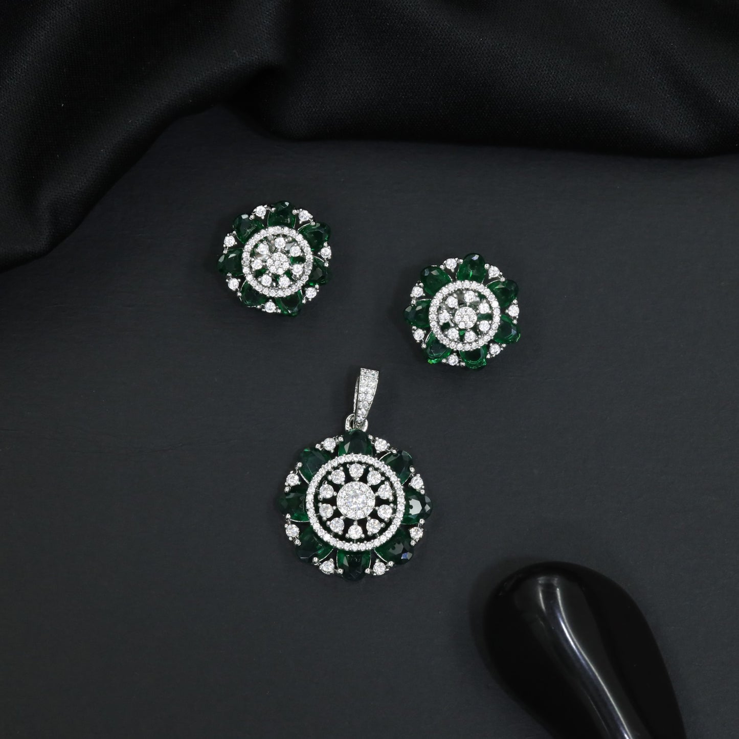 Designer pendant set featuring floral halo and circular styling