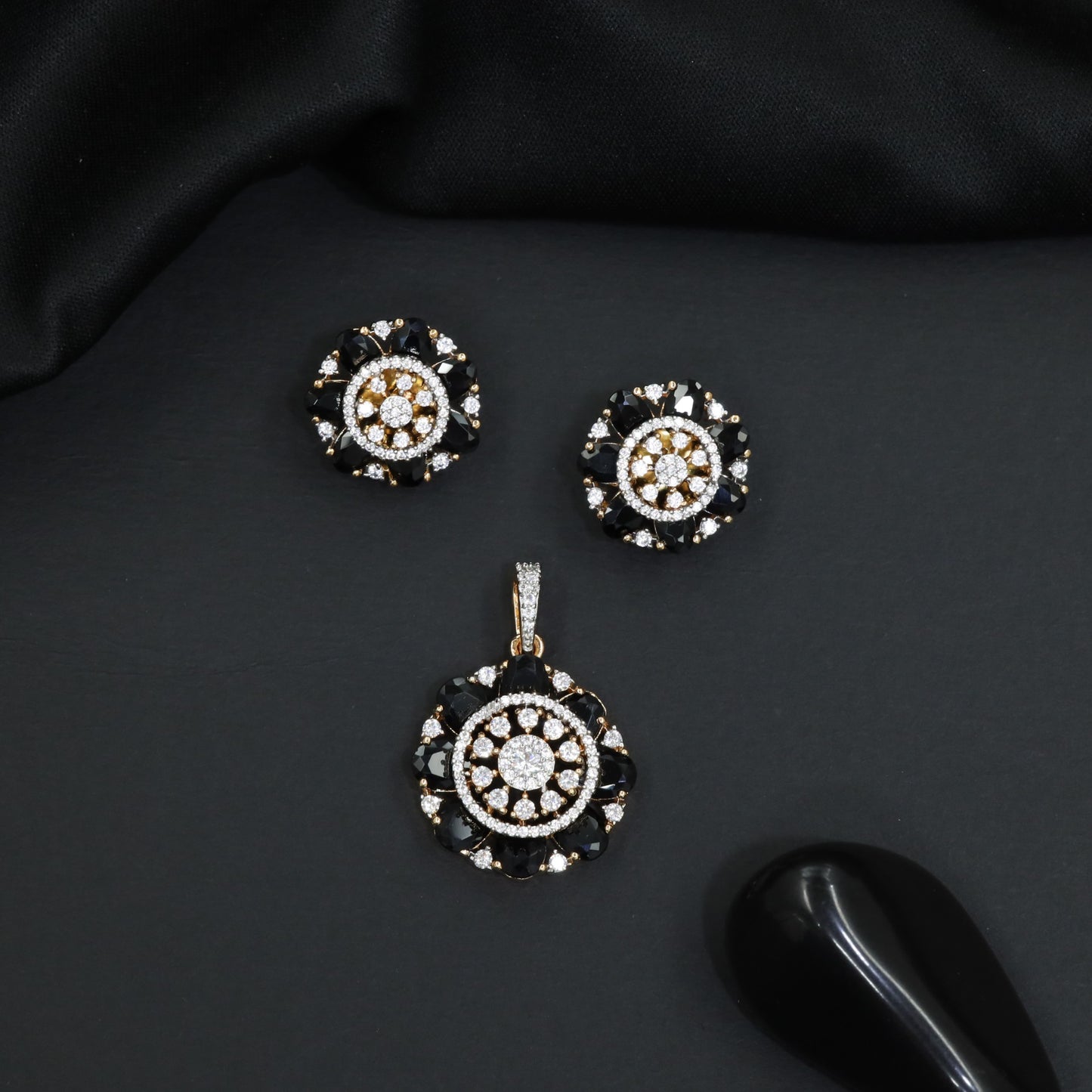 Designer pendant set featuring floral halo and circular styling