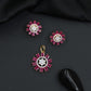 Round floral pendant set with structured sunray detailing