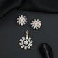 Round floral pendant set with structured sunray detailing