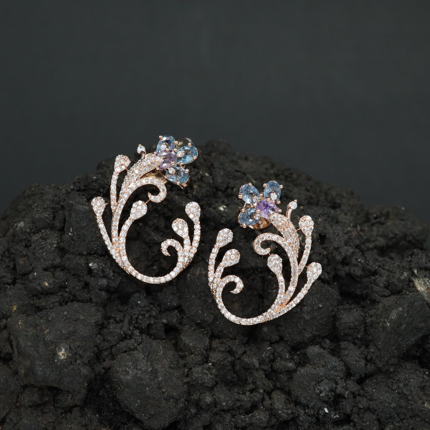 Decorative Floral Stud Earrings with Flowing Scroll Motif