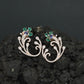 Decorative Floral Stud Earrings with Flowing Scroll Motif