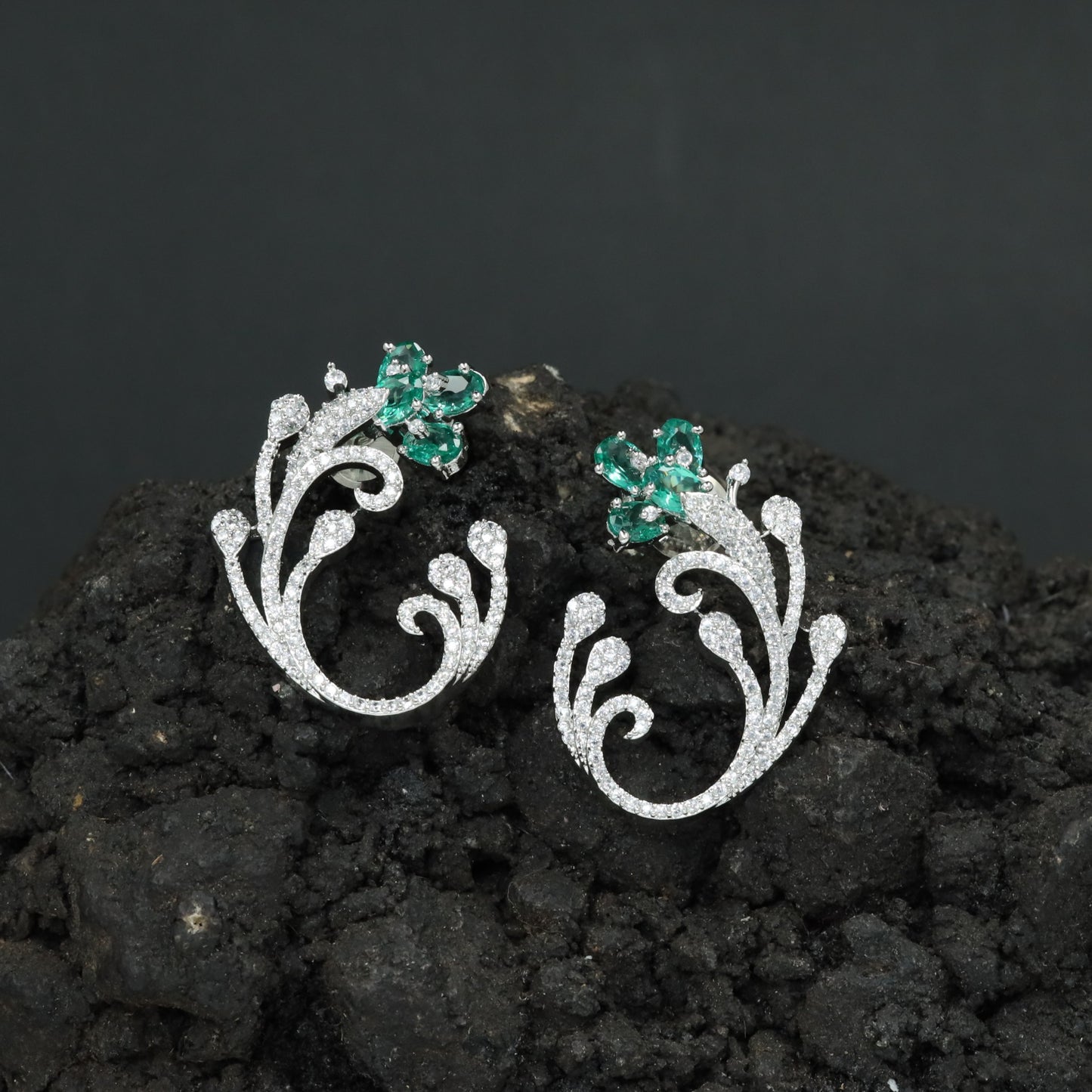Decorative Floral Stud Earrings with Flowing Scroll Motif