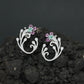 Decorative Floral Stud Earrings with Flowing Scroll Motif