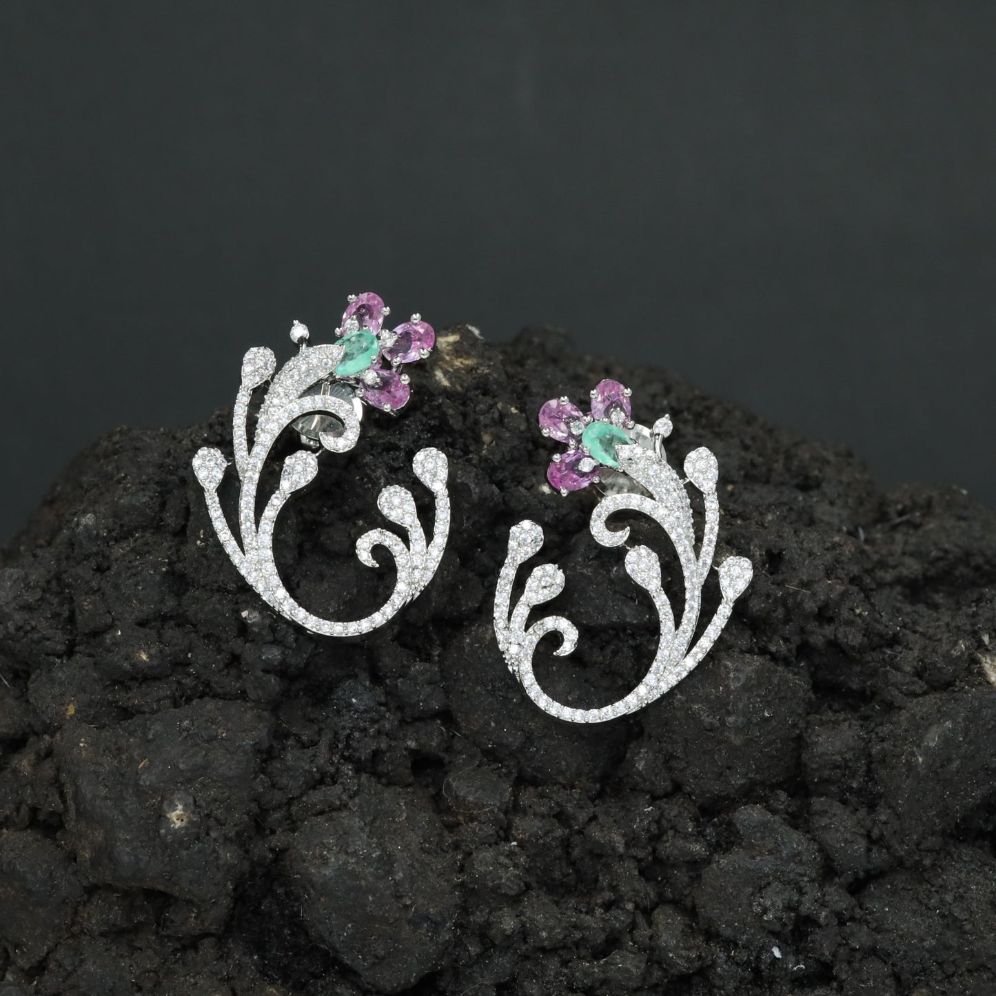 Decorative Floral Stud Earrings with Flowing Scroll Motif