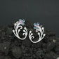 Decorative Floral Stud Earrings with Flowing Scroll Motif