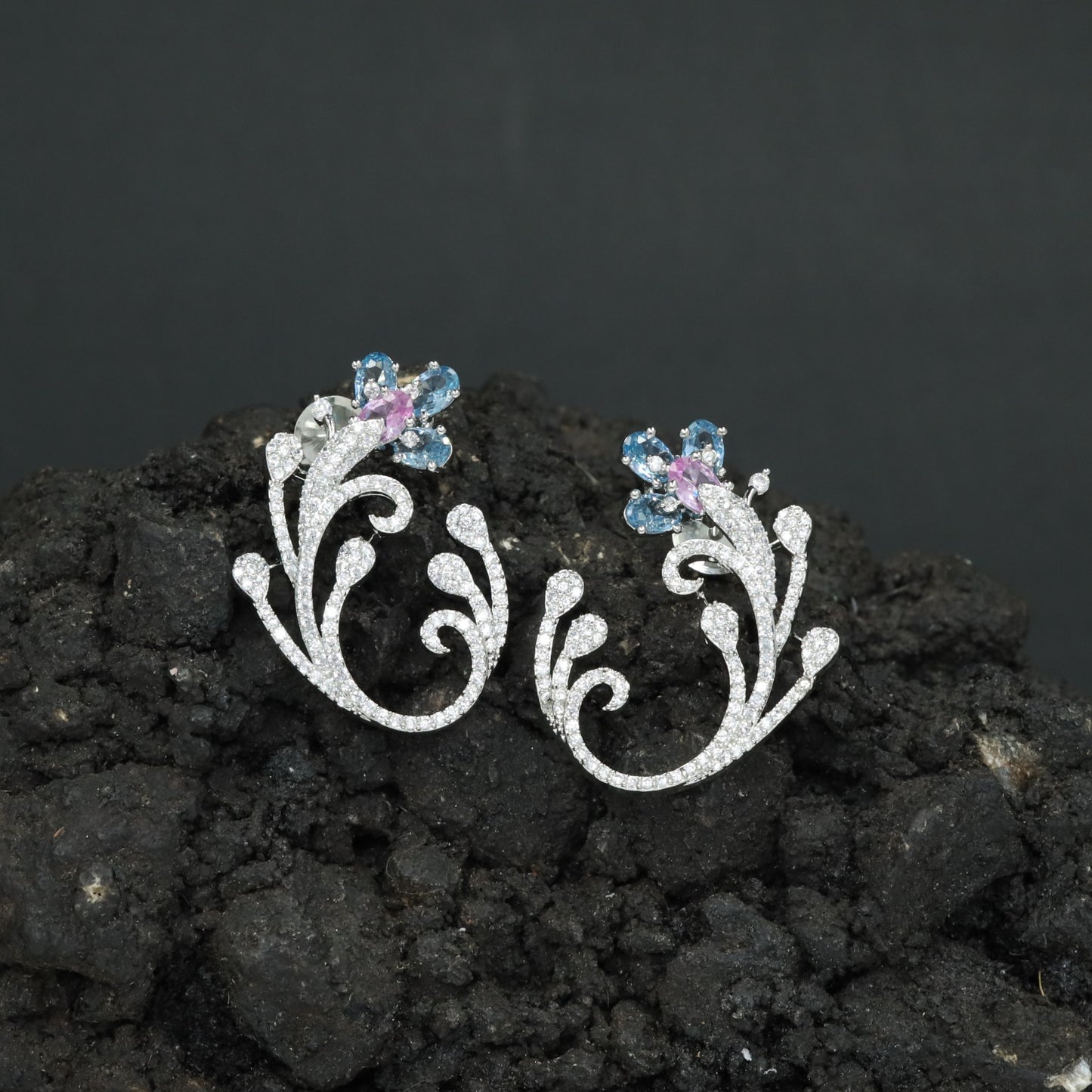 Decorative Floral Stud Earrings with Flowing Scroll Motif