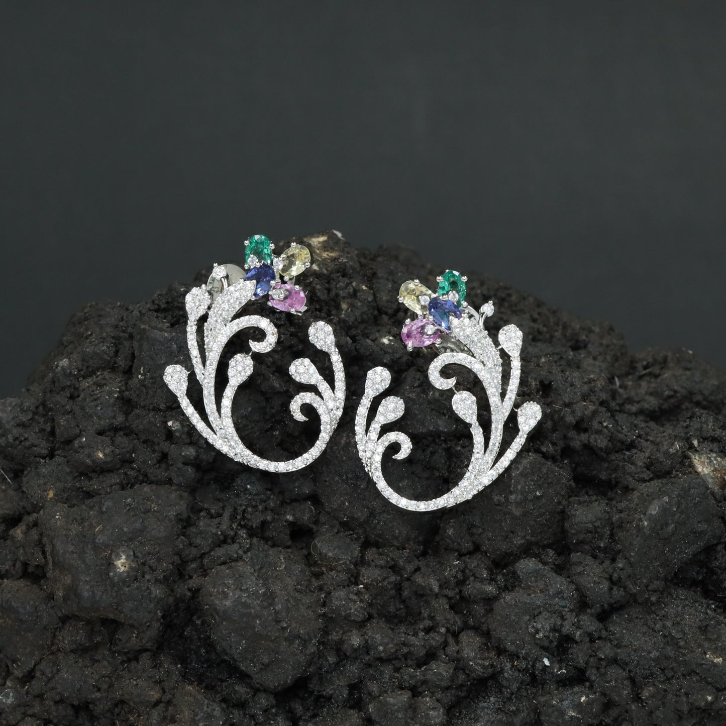 Decorative Floral Stud Earrings with Flowing Scroll Motif