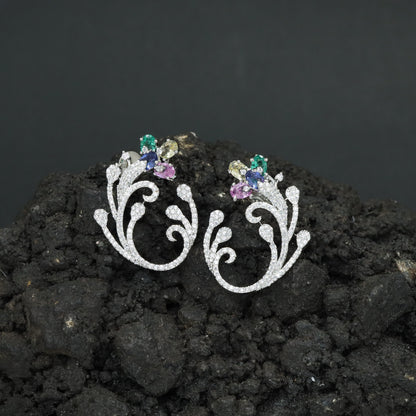 Couture Exclusive Rhodium Stud Featuring Curved Vines and Sculpted Leaf Forms