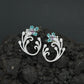 Decorative Floral Stud Earrings with Flowing Scroll Motif