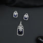 Open-frame pendant set with blossom centerpiece and matching studs