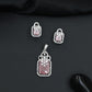 Open-frame pendant set with blossom centerpiece and matching studs
