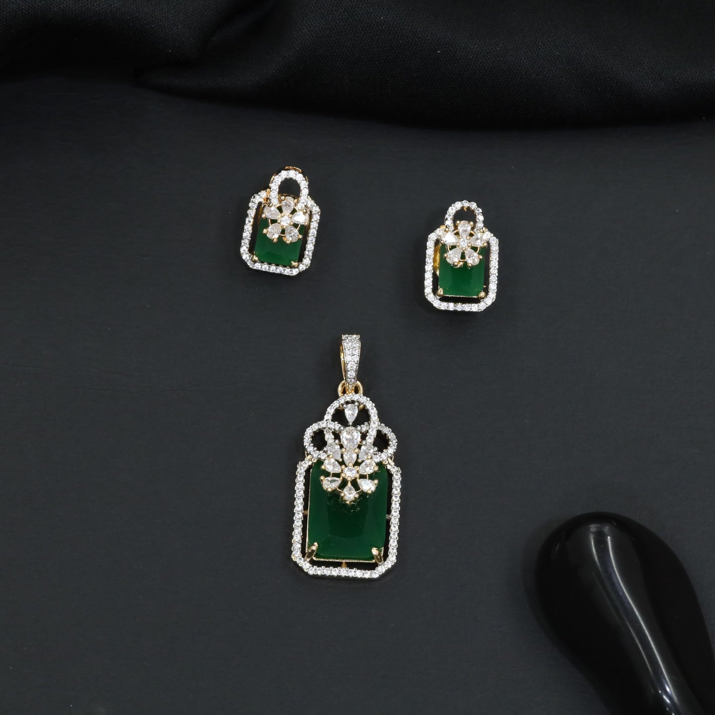 Open-frame pendant set with blossom centerpiece and matching studs