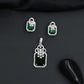 Open-frame pendant set with blossom centerpiece and matching studs