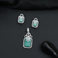 Open-frame pendant set with blossom centerpiece and matching studs