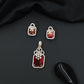 Open-frame pendant set with blossom centerpiece and matching studs