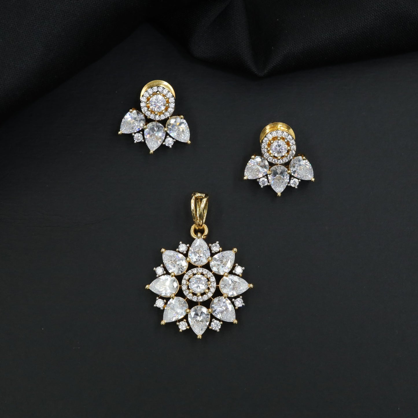 Festive blossom pendant set with petal cluster craftsmanship