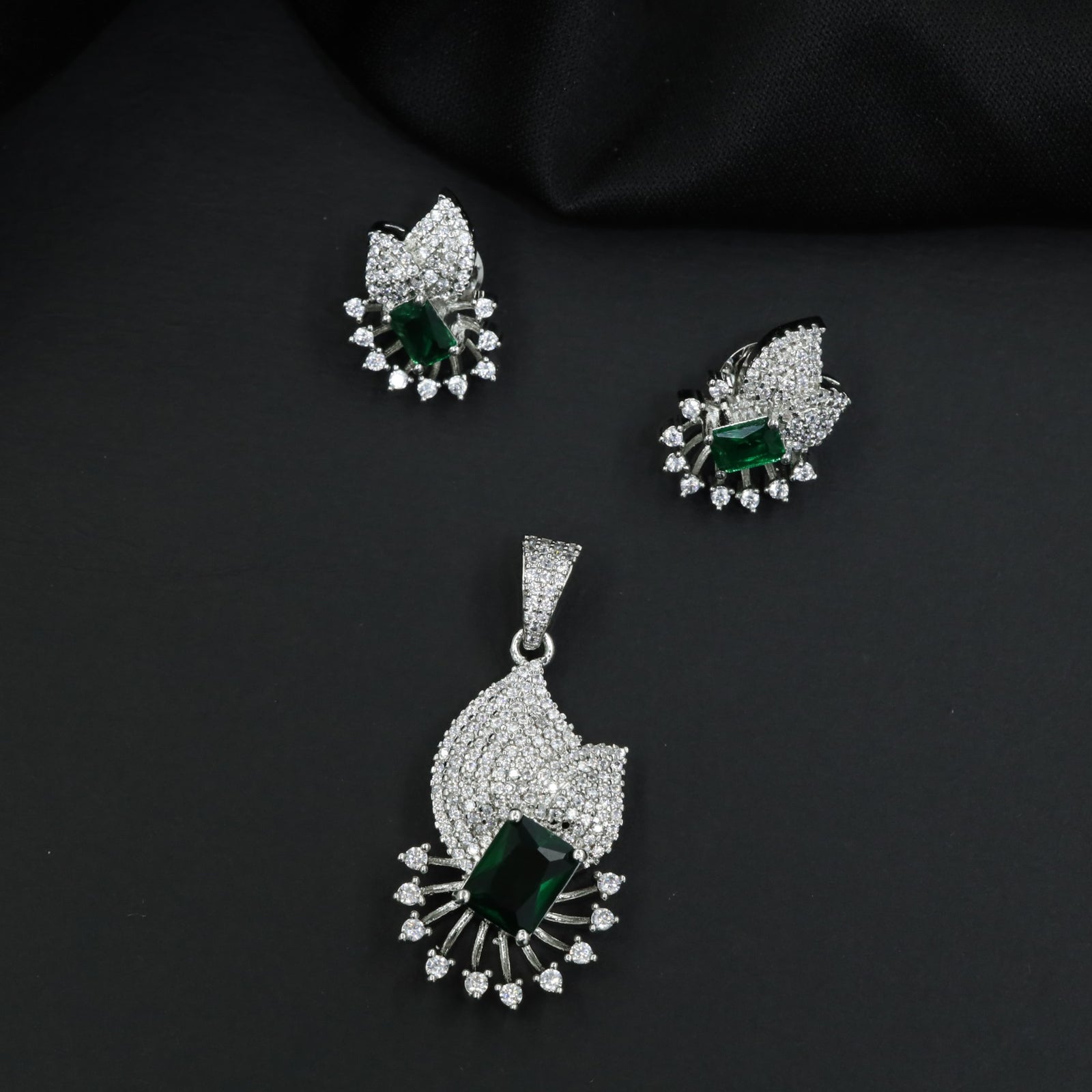 Crescent fan pendant set with geometric centerpiece detailing