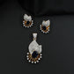 Crescent fan pendant set with geometric centerpiece detailing