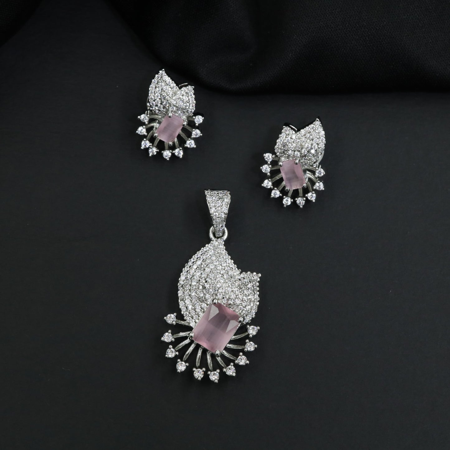 Crescent fan pendant set with geometric centerpiece detailing